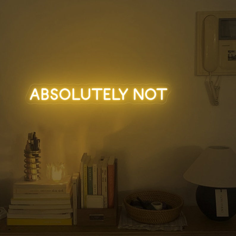 "Absolutely Not" LED Neon sign by LedNeons.com-  glowing boldly on a wall, adding a sassy and confident vibe to the room.