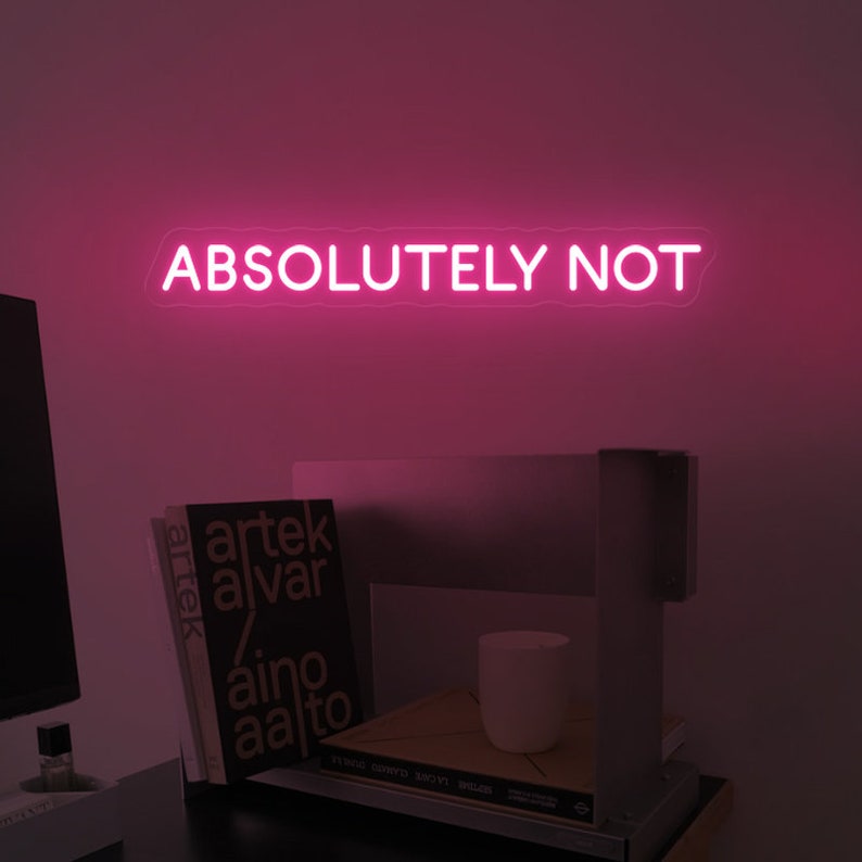 "Absolutely Not" LED Neon sign by LedNeons.com -  glowing boldly on a wall, adding a sassy and confident vibe to the room.