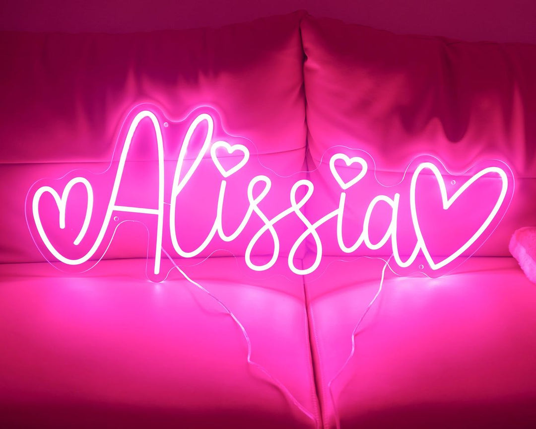 "Alissia" name LED Neon sign by LedNeons.com - lit up on a wall, offering a custom and elegant decorative touch.