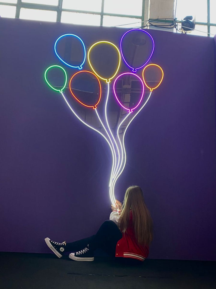 Balloon Bunch LED Neon sign by LEDNeons -  featuring a glowing cluster of colorful balloons, adding a festive and playful vibe to the space.