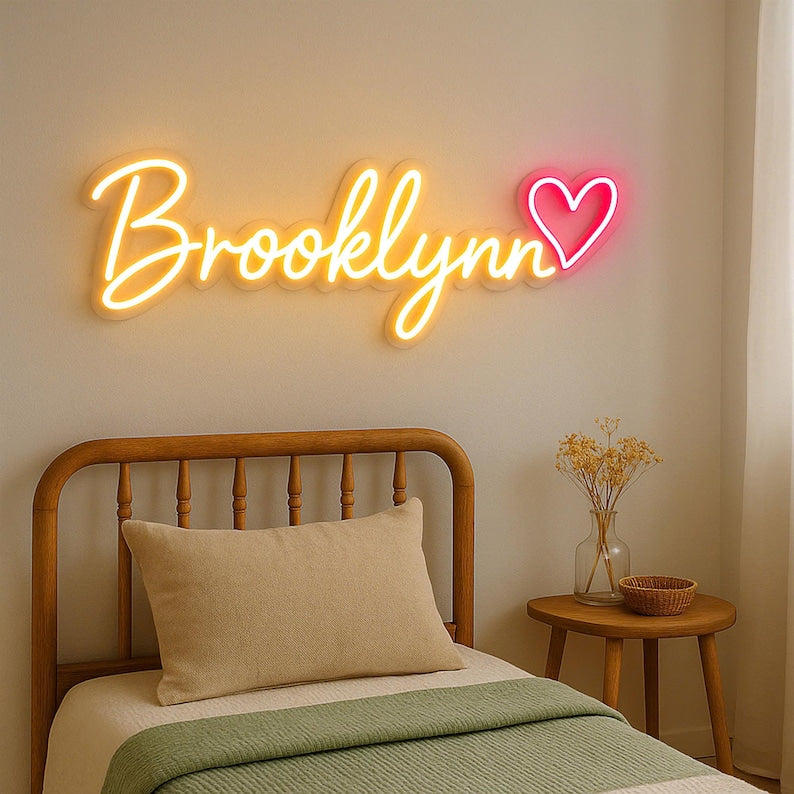 "Brooklyn" name LED Neon sign by LedNeons.com -  glowing on a wall, adding a personalized and modern touch to the decor.