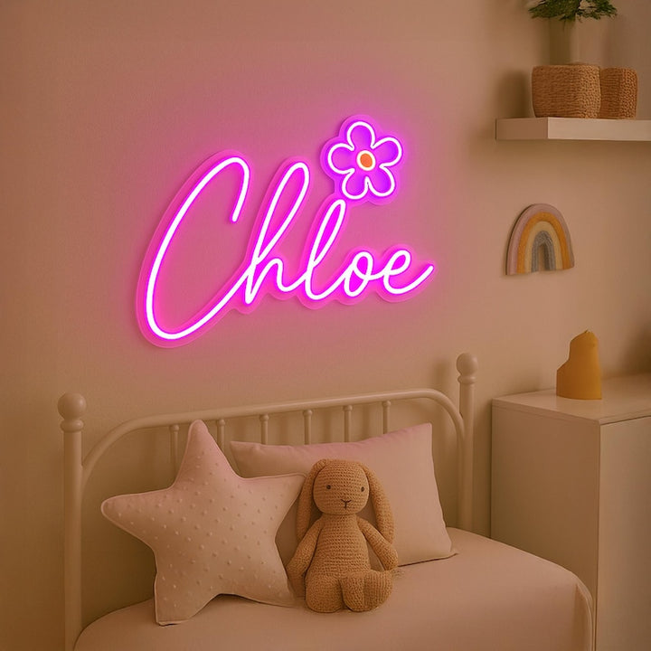 "Chloe" name Neon sign by LEDNeons -  lit up on a wall, offering a personalized and stylish decorative accent.