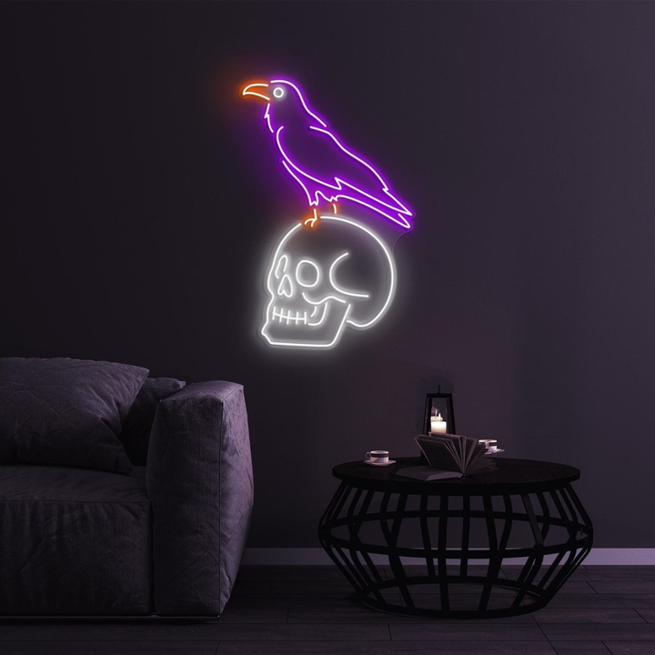 Crow Sitting Human Skull Halloween LED Neon Sign by LEDNeons - glowing spooky design, perfect for Halloween décor.
