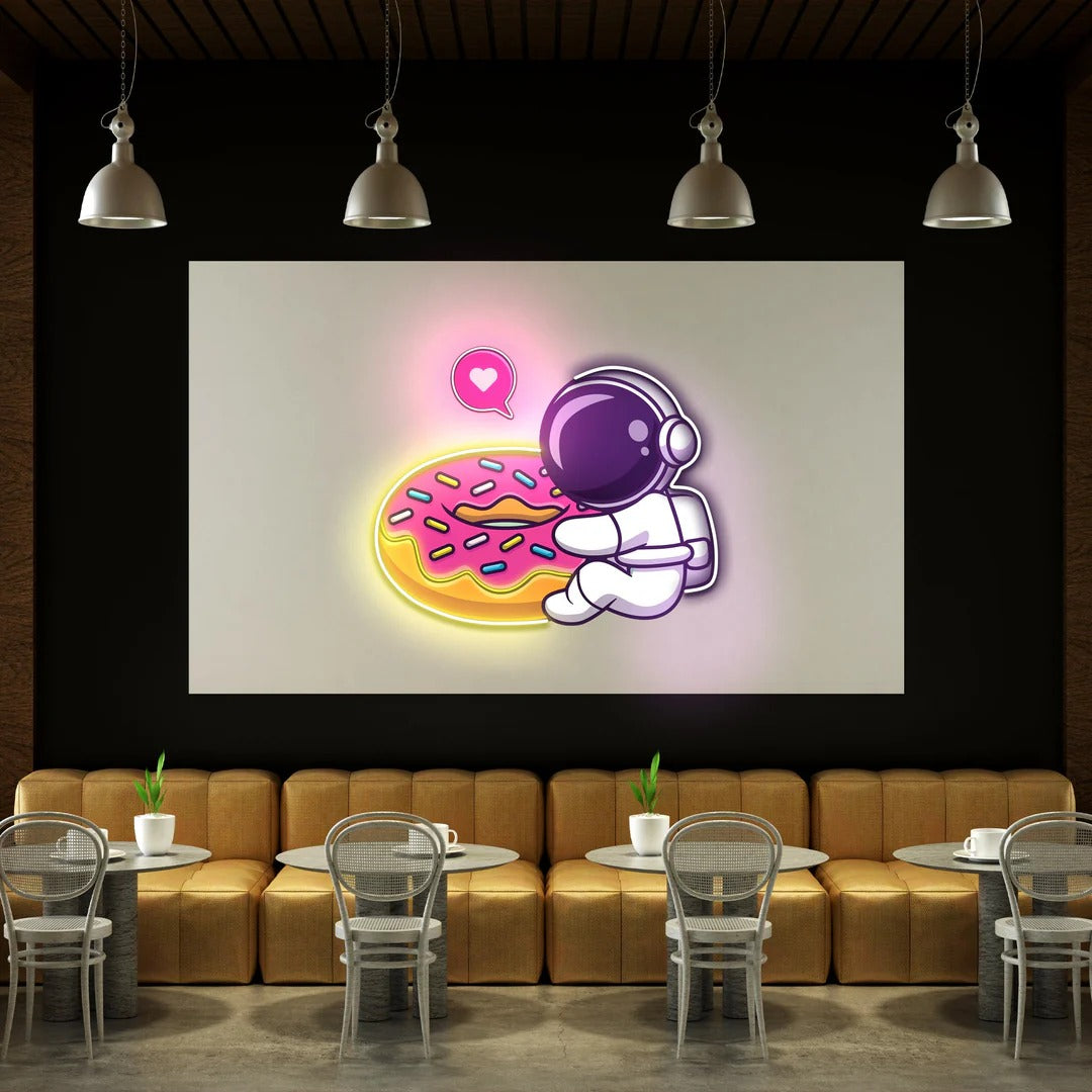 Donut Astronaut UV Light Neon Artwork by LEDNeons — a creative neon design featuring an astronaut holding or floating