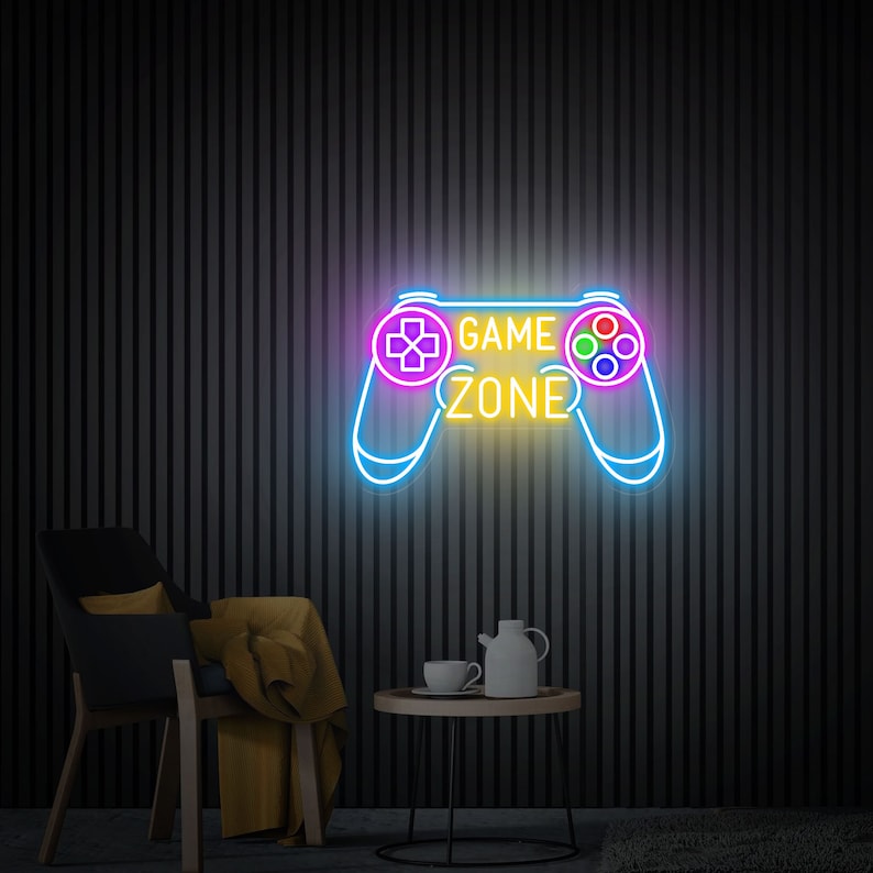 Game Zone LED Neon sign by LEDNeons -  mounted on a wall, adding vibrant light to a modern gaming setup.