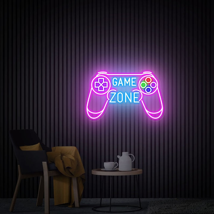 Game Zone LED Neon sign by LEDNeons  -  mounted on a wall, adding vibrant light to a modern gaming setup.