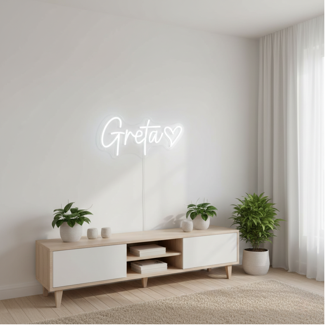 Greta Name LED Neon sign by LedNeons.com -  glowing on a wall, adding a personalized and stylish decorative element.