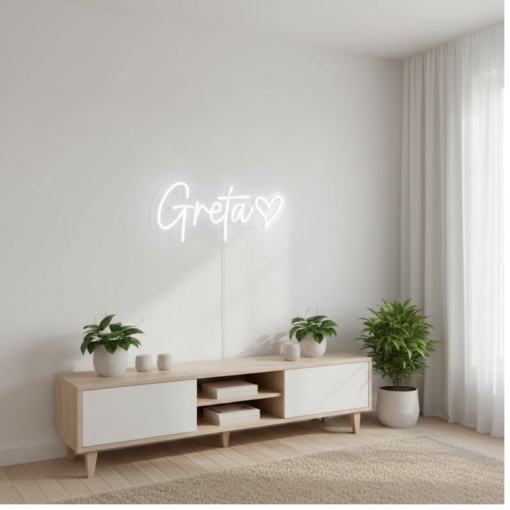 Greta Name LED Neon sign by LedNeons.com -  glowing on a wall, adding a personalized and stylish decorative element.