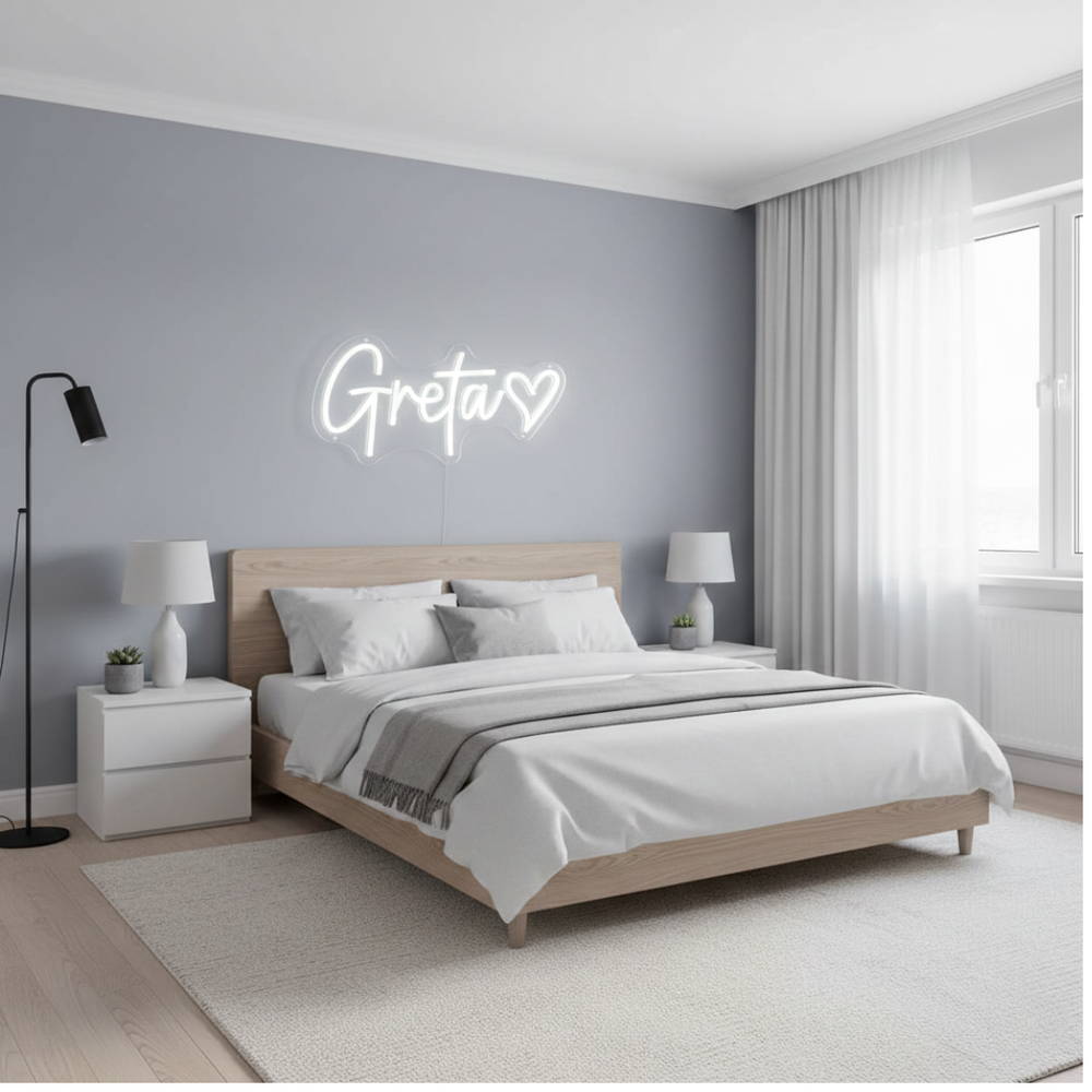 Greta Name LED Neon sign by LedNeons.com -  glowing on a wall, adding a personalized and stylish decorative element.