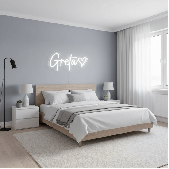 Greta Name LED Neon sign by LedNeons.com -  glowing on a wall, adding a personalized and stylish decorative element.