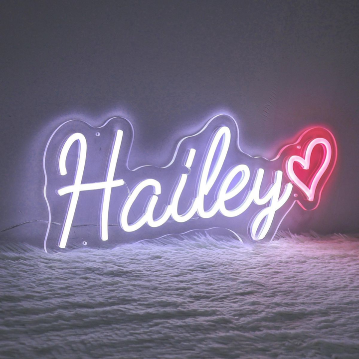 Hailey Name LED Neon sign by LEDNeons  - glowing brightly on a wall, adding a custom and stylish touch to the decor.