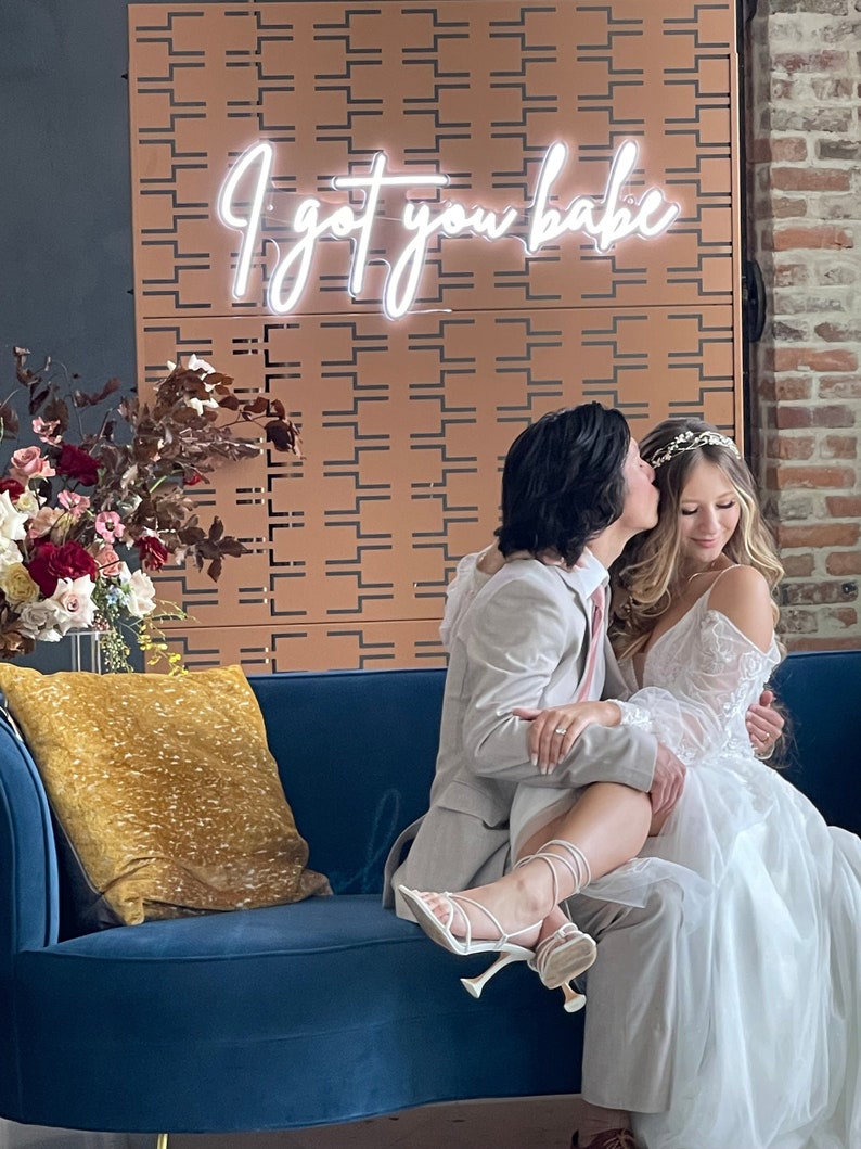 I Got You Babe wedding neon sign by LEDNeons -  perfect for romantic receptions, photo backdrops, or anniversary celebrations.