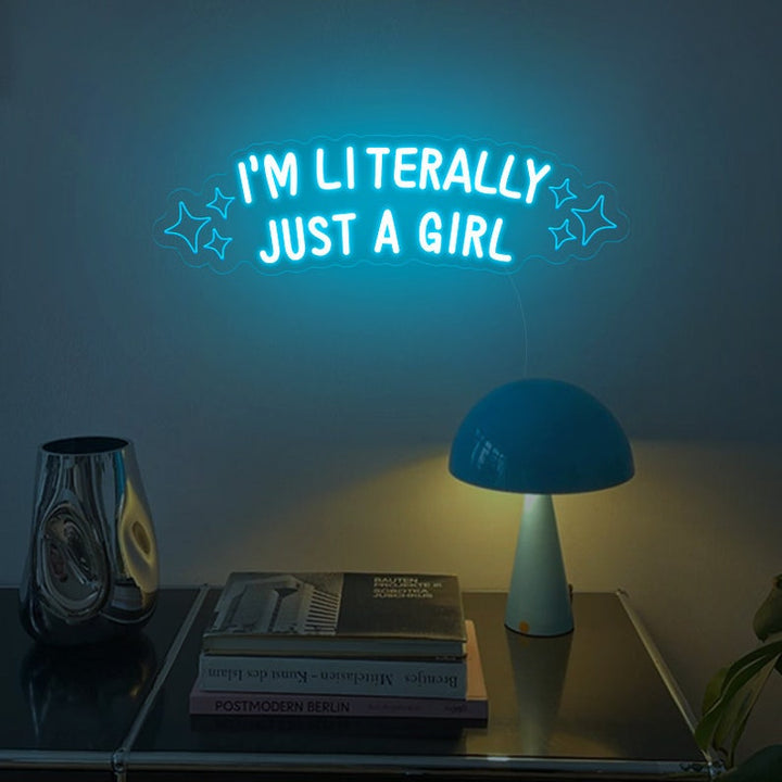 "I'm Literally Just A Girl" LED Neon sign by LEDNeons  - glowing in playful script on a wall, adding a fun and confident vibe to the space.