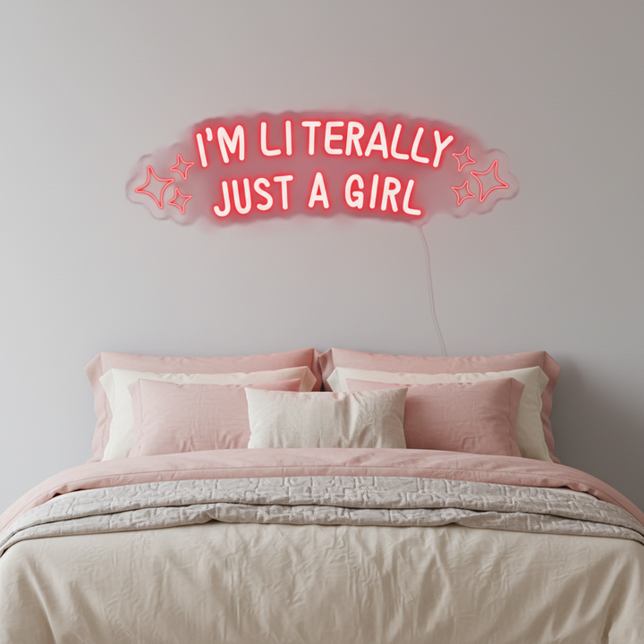 I'm Literally Just A Girl" LED Neon sign by LEDNeons  - glowing in playful script on a wall, adding a fun and confident vibe to the space.