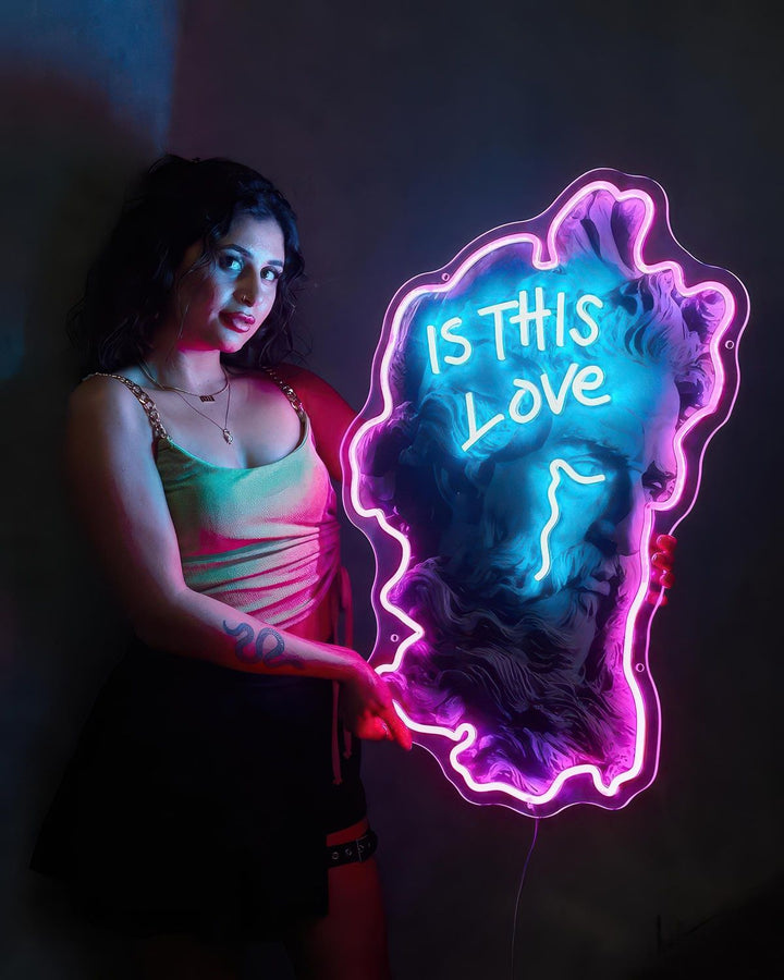 Is This Love UV Art LED Neon Sign by LEDNeons - a romantic neon artwork glowing under UV light