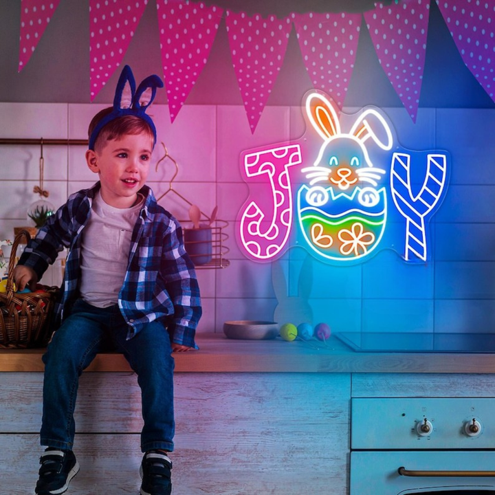 Joy Bunny Easter neon sign glowing on wall for festive décor by LEDNeons
