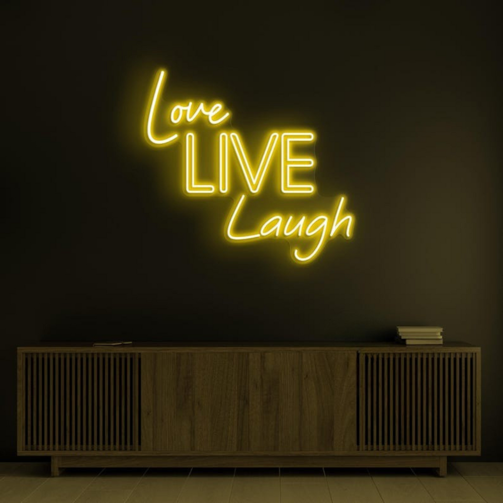 Love Live Laugh LED Neon Sign by LedNeons.com -  with glowing script text, ideal for adding a positive and uplifting vibe to home or office decor.


