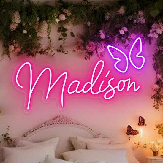 "Madison" name LED Neon sign by LedNeons.com -  glowing brightly on a wall, adding a personalized and modern touch to the decor