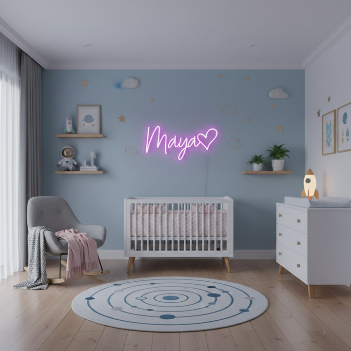 Maya Name LED Neon Sign by LedNeons.com -  glowing in elegant cursive font on a wall backdrop