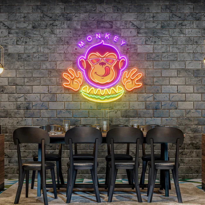 Monkey Logo Hotdog UV Art LED Neon Sign in purple and yellow color by LedNeons.com - perfect for restaurants, cafés, and fun wall décor.