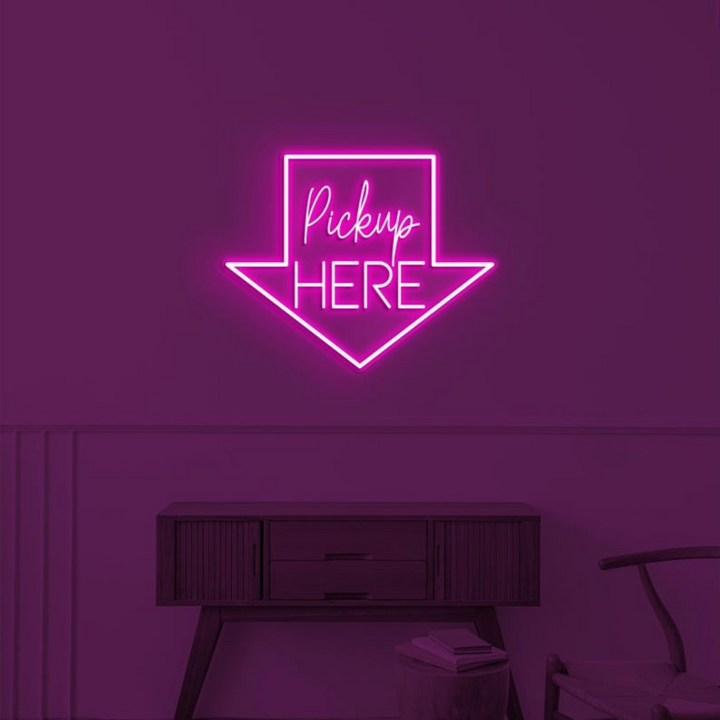 Pick Up Here" With Arrow Neon sign by LEDNeons - brightly glowing to direct customers to the pickup area.