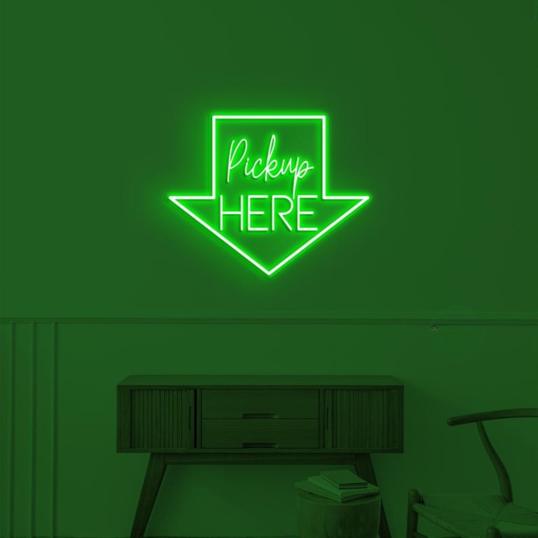 Pick Up Here" With Arrow Neon sign by LEDNeons - brightly glowing to direct customers to the pickup area.