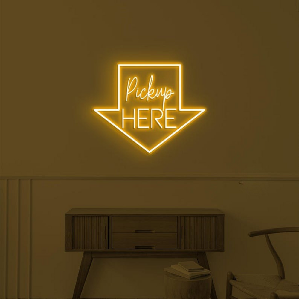 Pick Up Here" With Arrow Neon sign by LEDNeons - brightly glowing to direct customers to the pickup area.