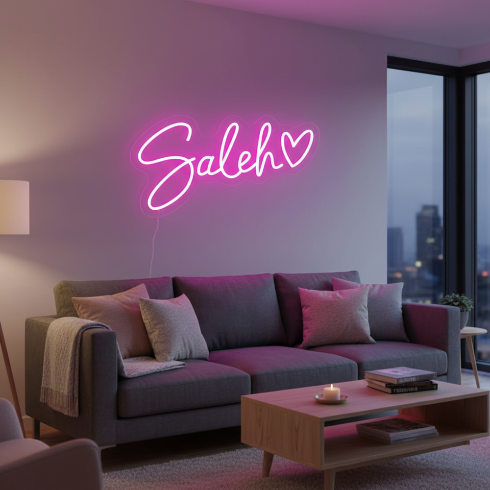 Saleh Name LED Neon Sign by LEdNeons -  glowing in elegant script font on a wall
