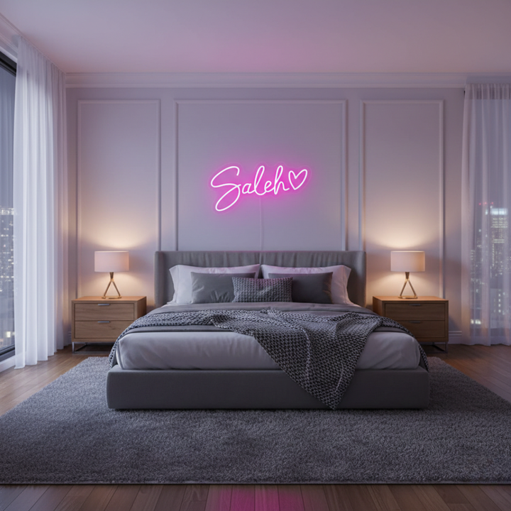 Saleh Name LED Neon Sign by LEdNeons -  glowing in elegant script font on a wall
