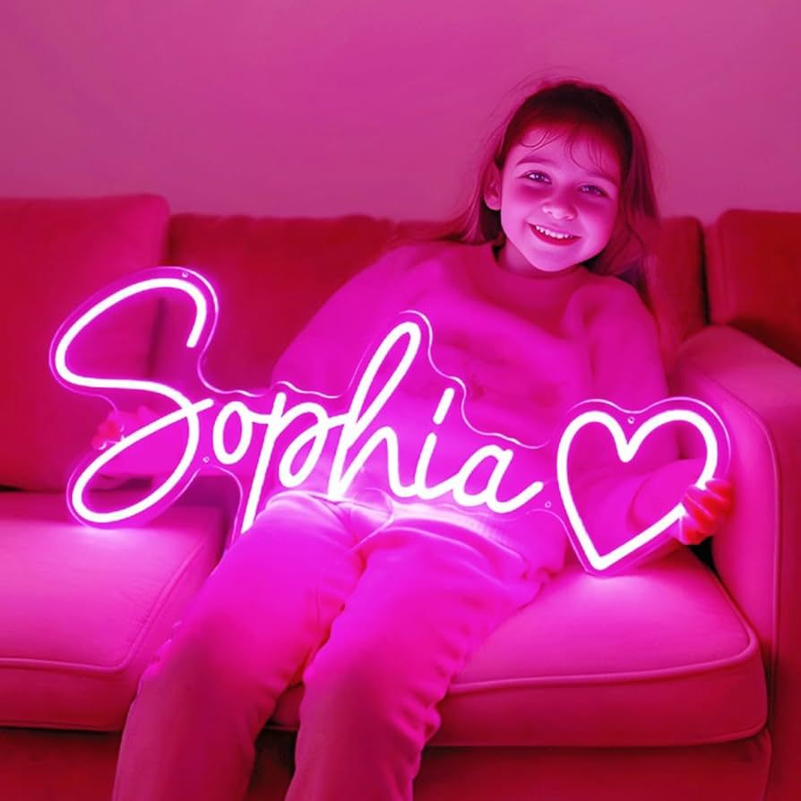 "Sophia" Name LED Neon sign by LEDNeons  - glowing on a wall, adding a personalized and stylish decorative accent.
