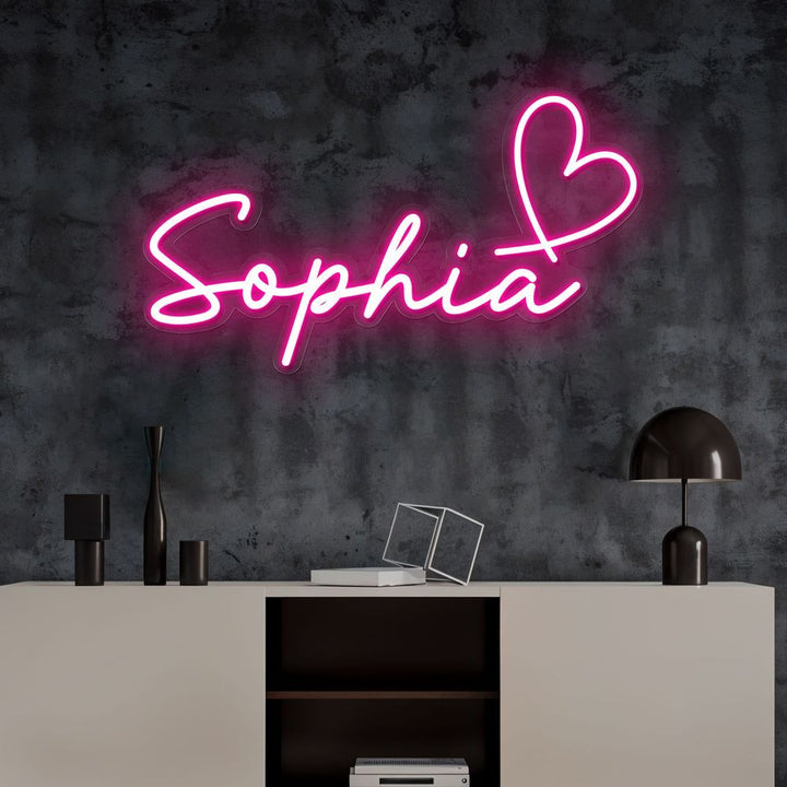 "Sophia" Name LED Neon sign by LEDNeons  - glowing on a wall, adding a personalized and stylish decorative accent.