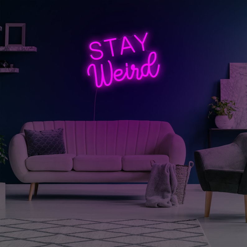 Stay Weird LED Neon Sign by LedNeons.com - bold, colorful lettering, ideal for expressing individuality in creative spaces. 