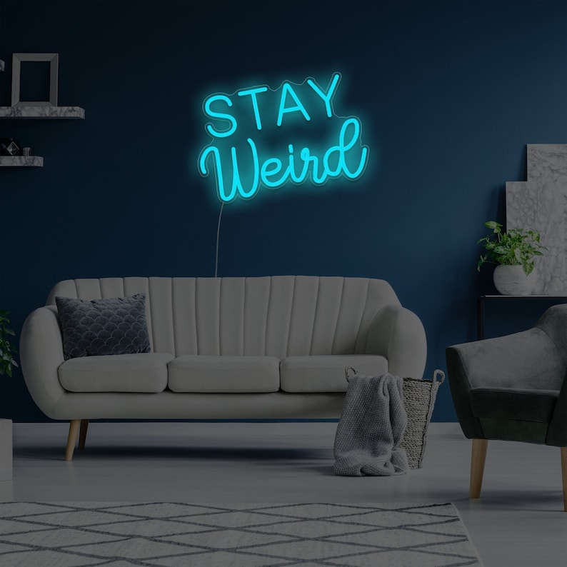 Stay Weird LED Neon Sign by LedNeons.com - bold, colorful lettering, ideal for expressing individuality in creative spaces.