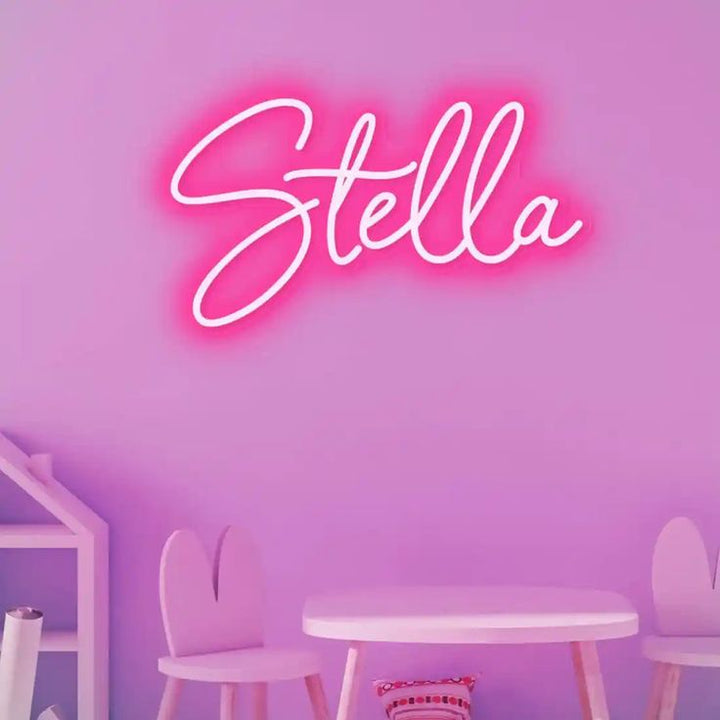 Stella" Name LED Neon sign by LEDNeons - glowing softly on a wall, adding a personalized and elegant decorative touch.