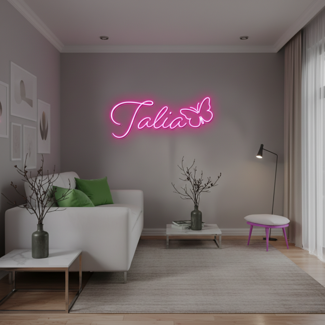 Talia Name LED Neon Sign by LEDNeons - glowing in elegant cursive font on wall backdrop"