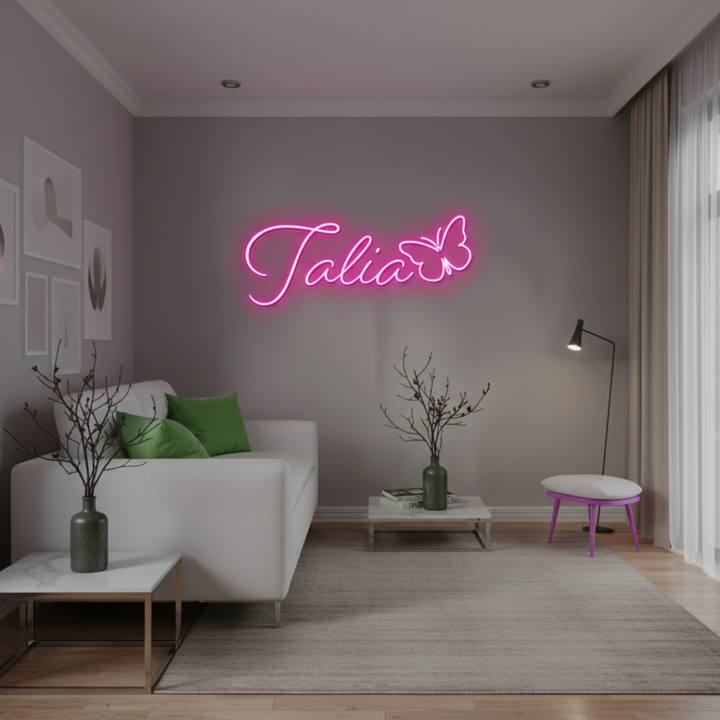 Talia Name LED Neon Sign by LEDNeons - glowing in elegant cursive font on wall backdrop"