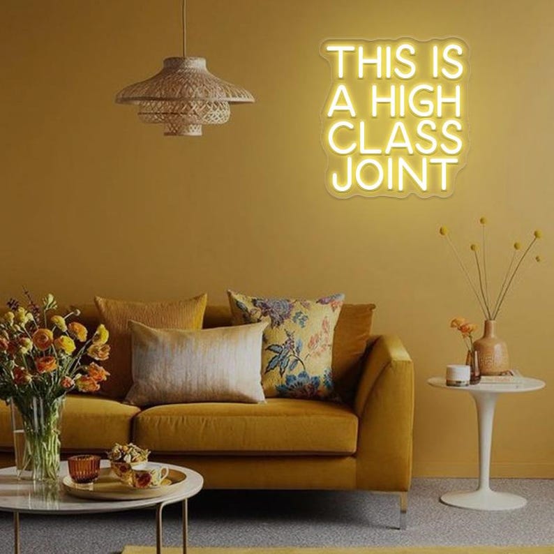 This Is A High Classy Joint LED Neon Sign by LedNeons.com -  with bold, vintage-style neon lettering, ideal for adding a playful and stylish touch to bars or home decor.