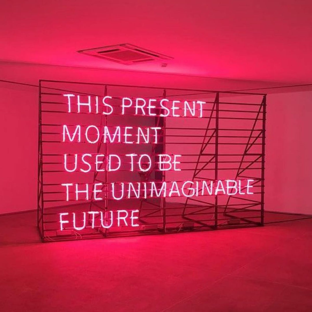 This Present Moment Used To Be The Unimaginable Future inspirational LED Neon Sign by LEDNeons, glowing mindfulness wall light for home or office décor.