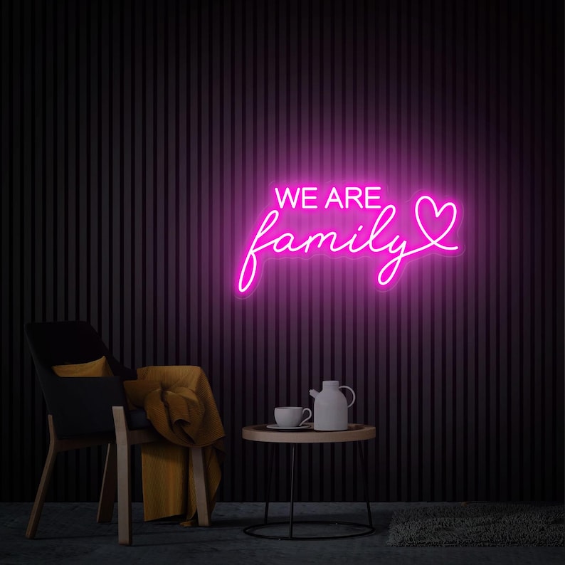 We Are Family LED Neon Sign by LedNeon.com - with glowing script text, symbolizing love and unity.